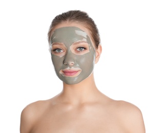 Photo of Beautiful woman with clay mask on her face against white background