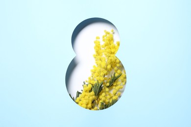 Photo of 8 March greeting card design with mimosa flowers, top view. Happy International Women's Day