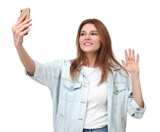 Beautiful woman taking selfie on white background