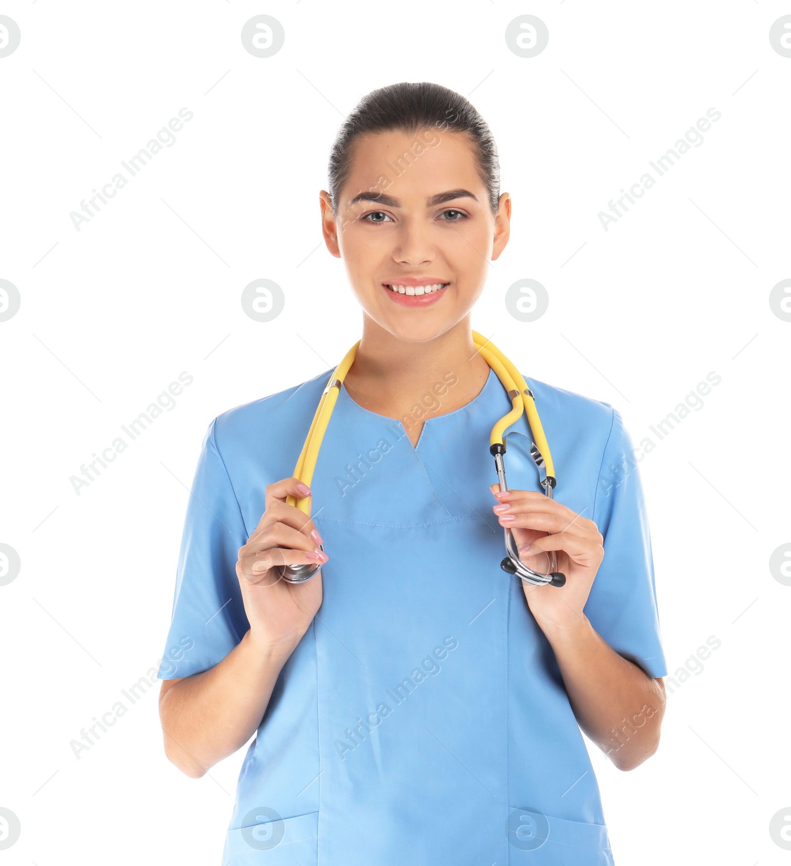 Photo of Portrait of young medical assistant with stethoscope on white background