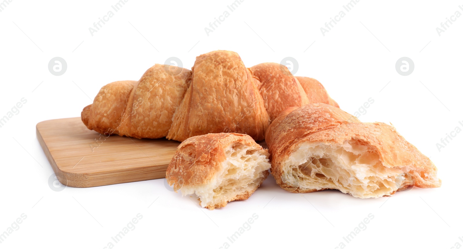 Photo of Tasty fresh crispy croissants on white background