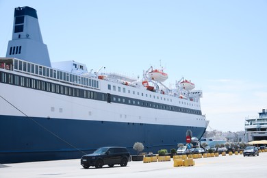 PIRAEUS, GREECE - MAY 19, 2022: Picturesque view of port with Blue Star ferry on sunny day