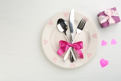 Photo of Beautiful table setting on white wooden background, flat lay with space for text. Valentine's Day dinner