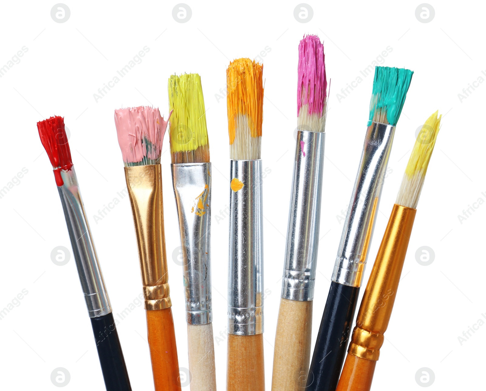 Photo of Different brushes with paints on white background