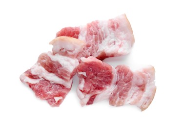 Photo of Pieces of tasty pork fatback on white background, top view