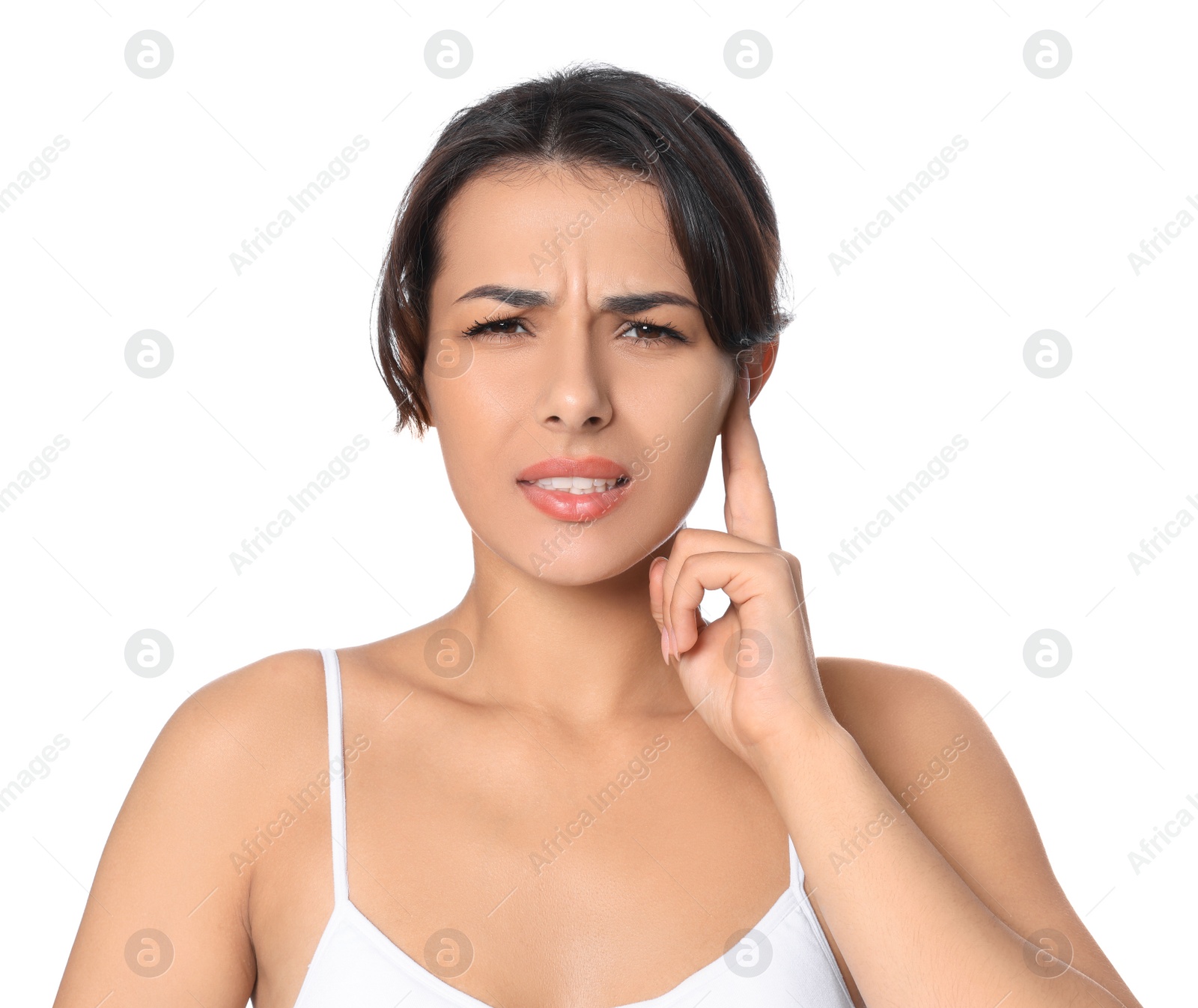 Photo of Young woman suffering from ear pain on white background