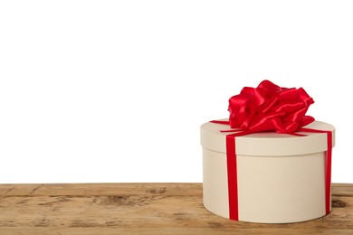 Beautiful gift box on wooden table against white background, space for text