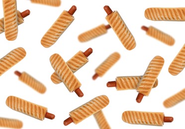 Many yummy French hot dogs with grilled buns falling on white background