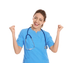 Photo of Portrait of emotional medical doctor with stethoscope isolated on white