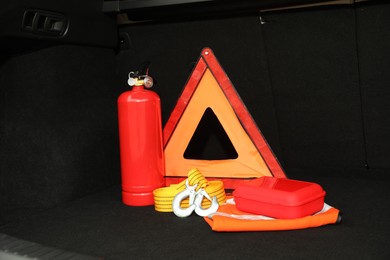 Set of car safety equipment in trunk