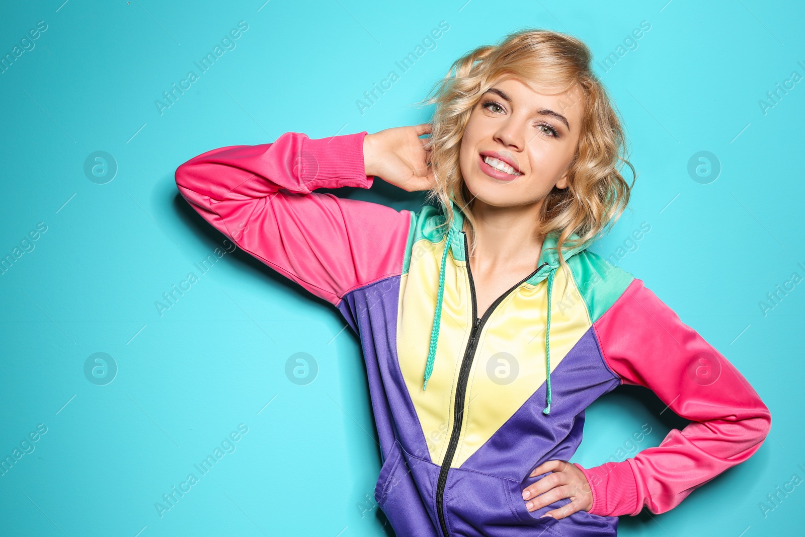 Photo of Stylish young woman posing on color background