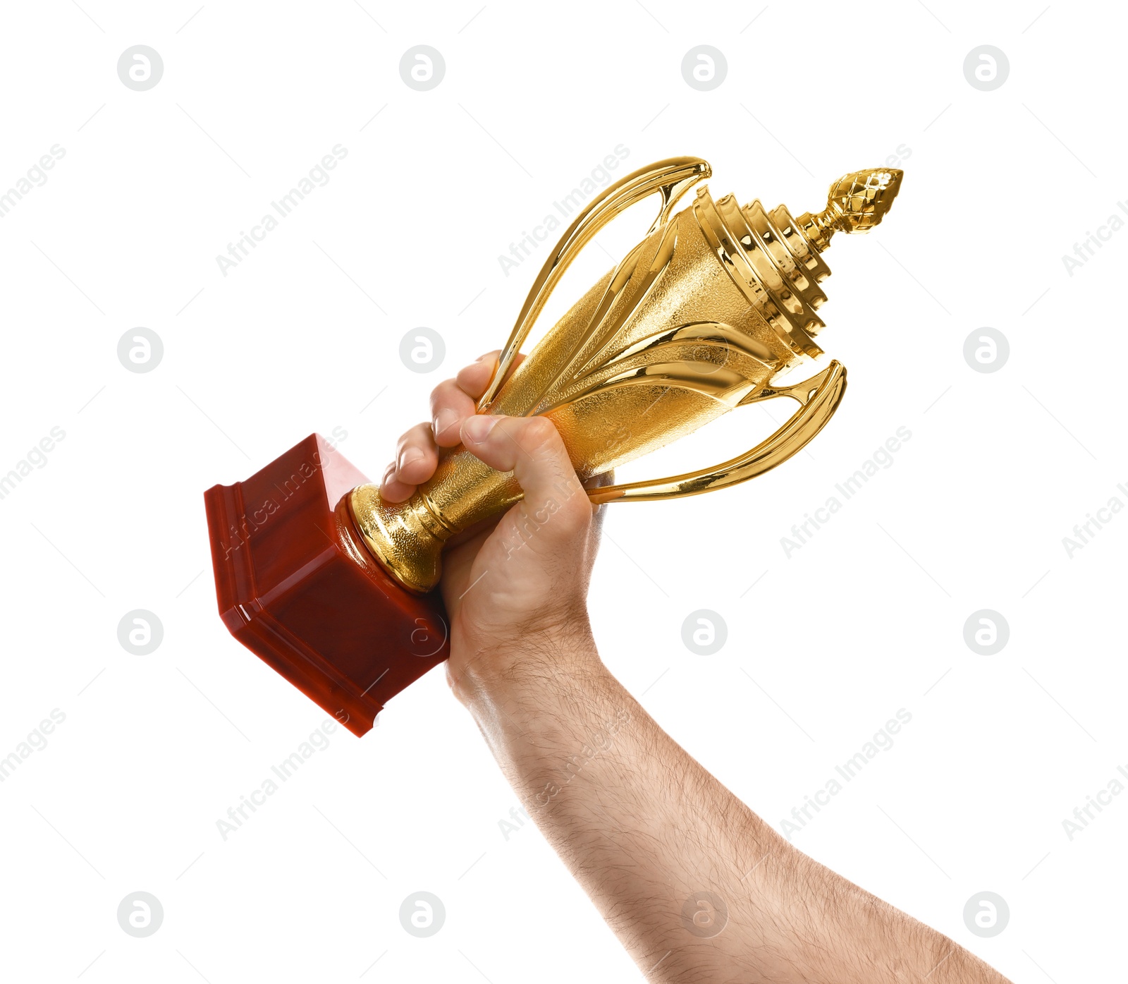 Photo of Young man holding gold trophy cup on white background, closeup