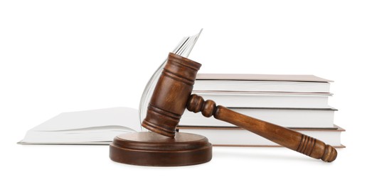 Photo of Wooden gavel and books on white background