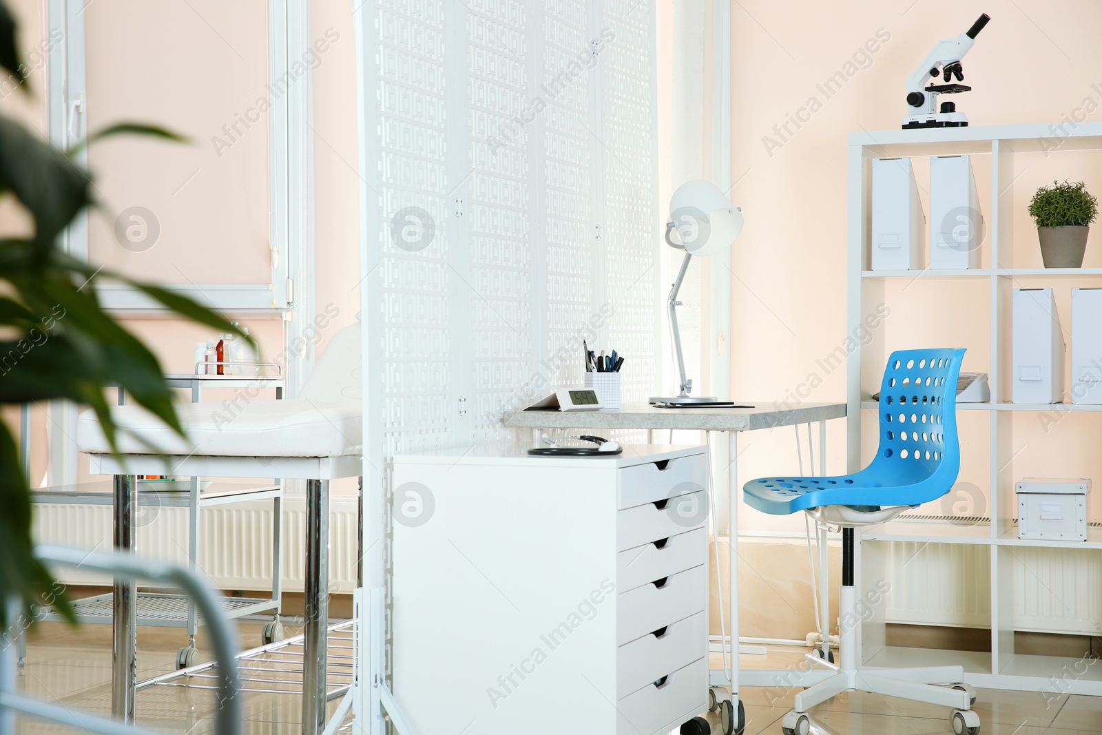 Photo of Modern interior of doctor's office with workplace