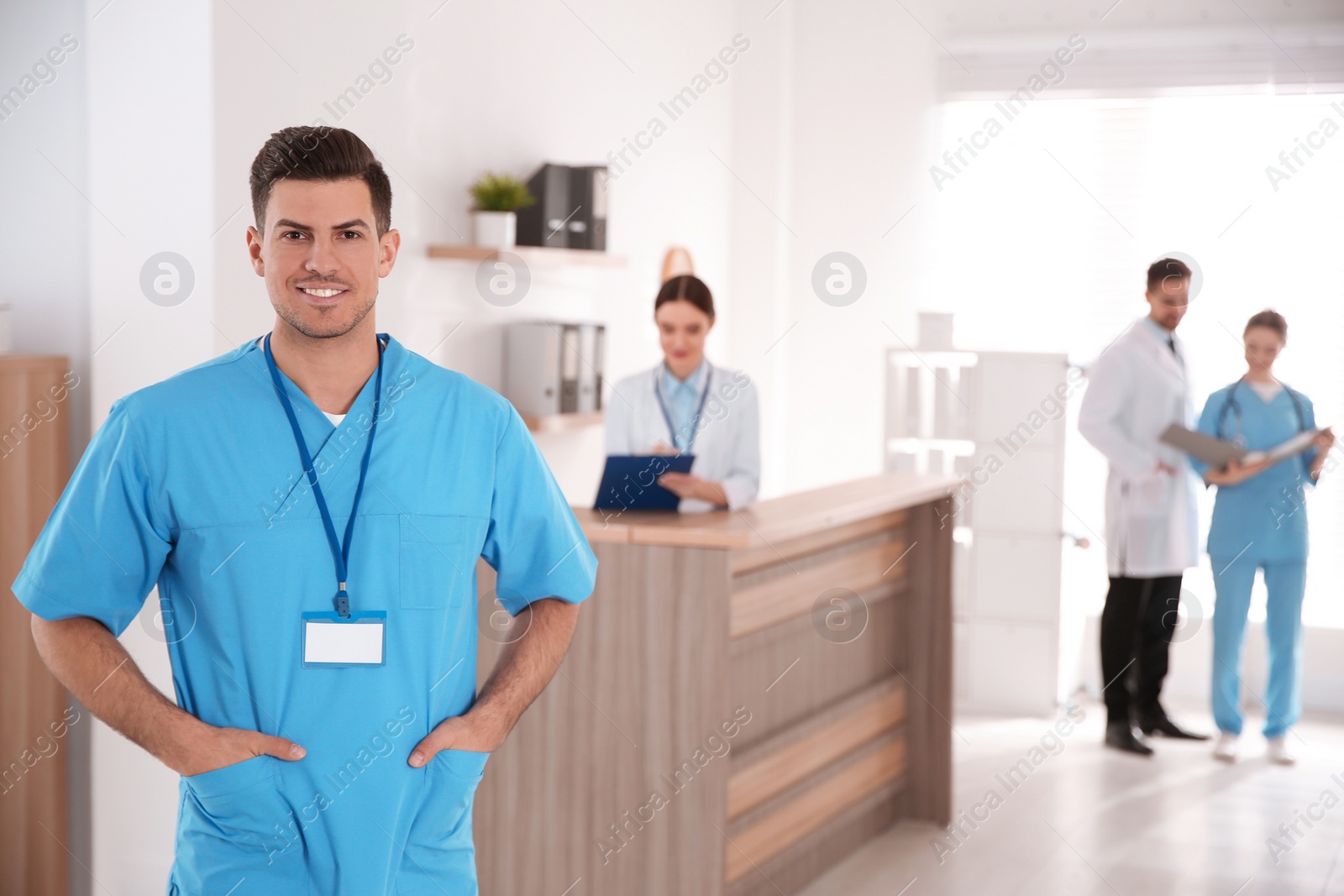 Photo of Portrait of male doctor in modern clinic