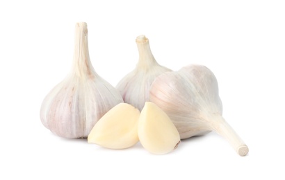 Fresh organic garlic bulbs and cloves on white background