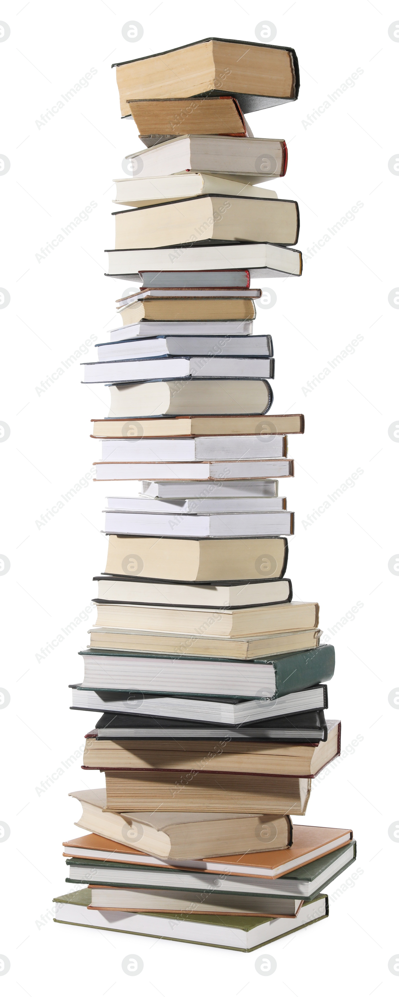 Photo of High stack of many different books isolated on white