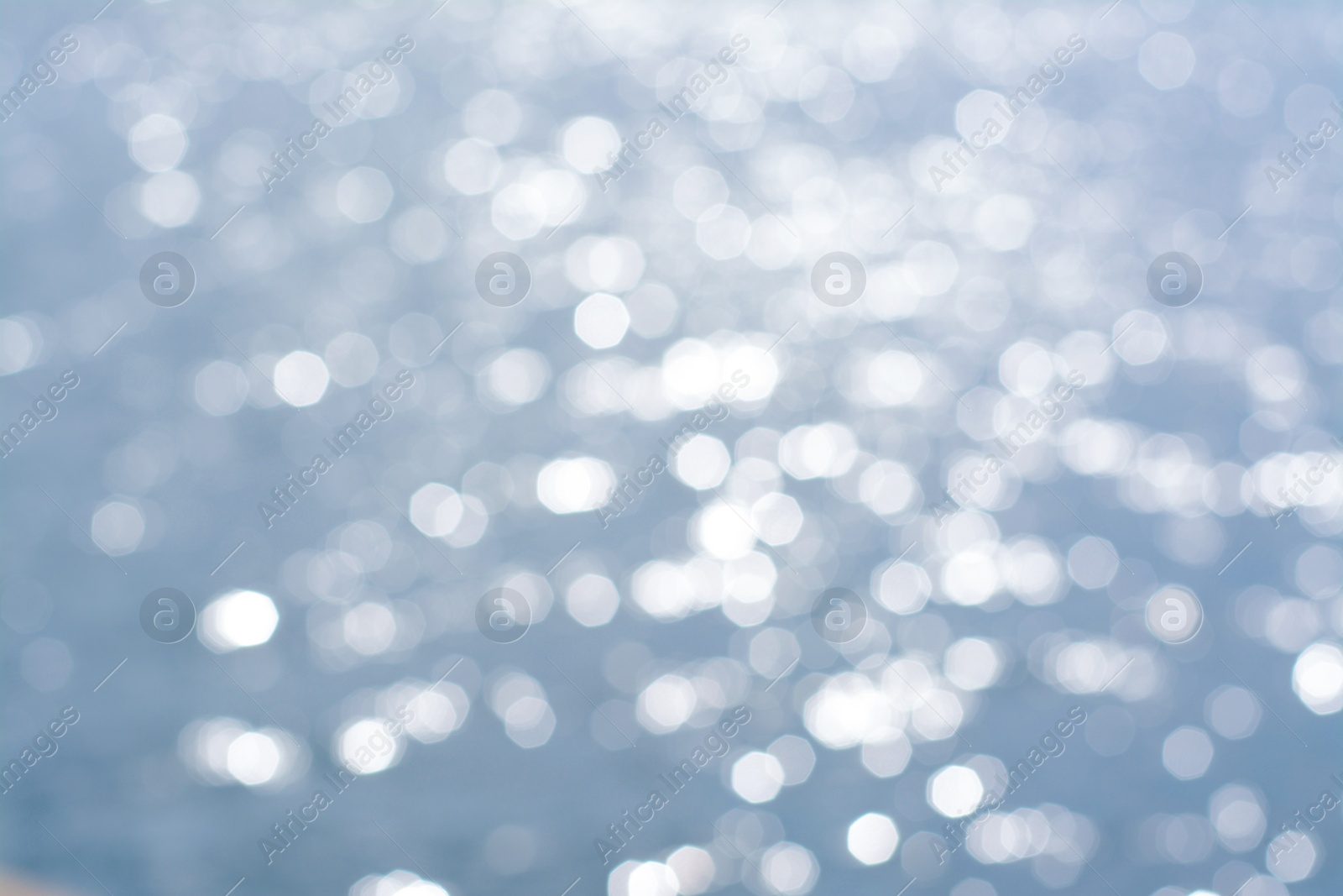 Photo of Blurred view of seascape on sunny day, bokeh effect