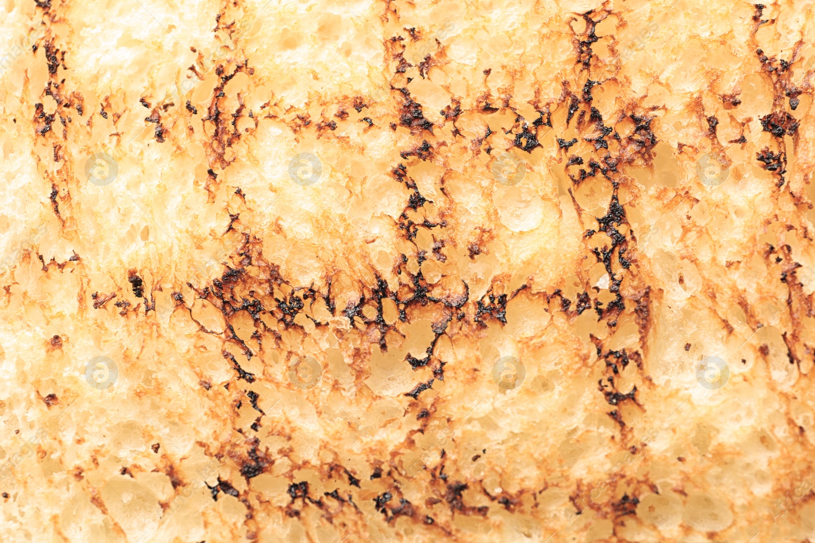 Photo of Toasted bread as background, closeup