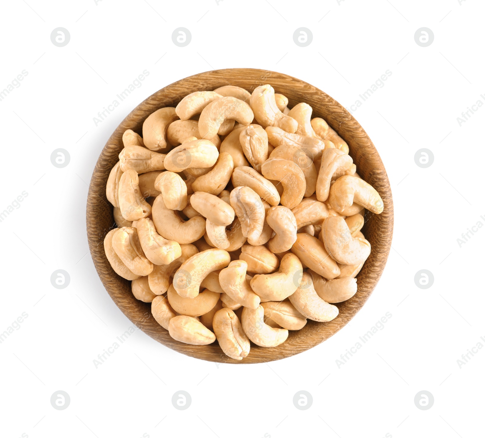 Photo of Tasty cashew nuts in bowl isolated on white, top view