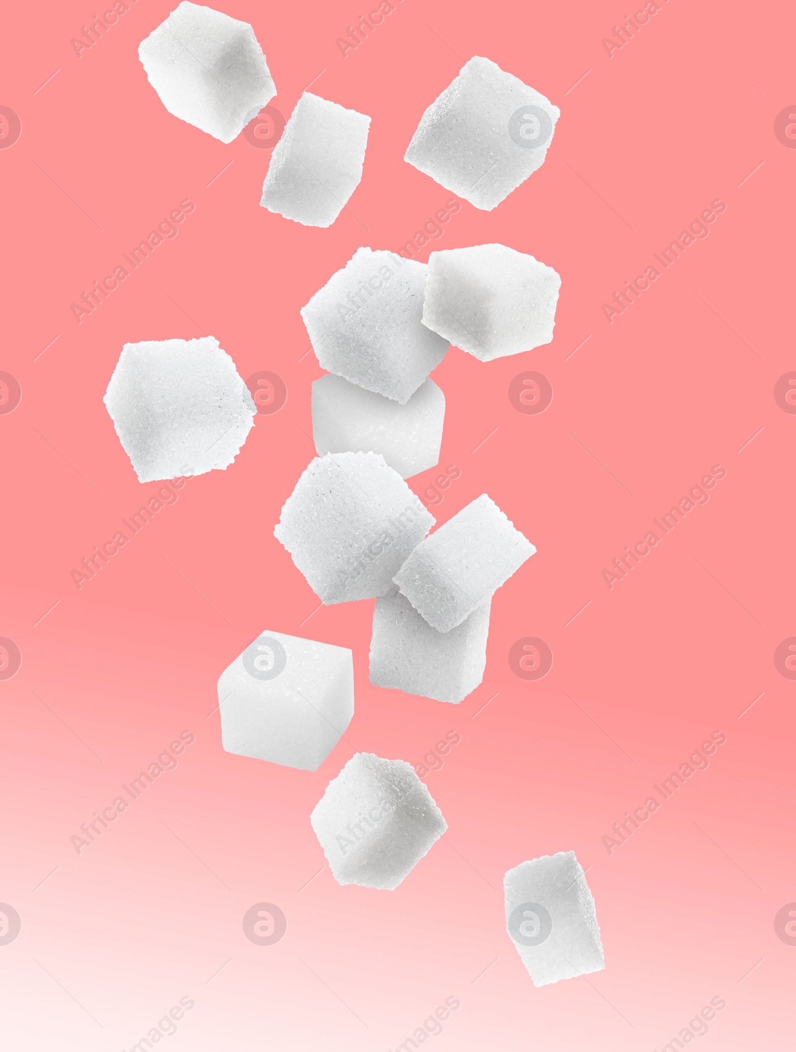 Image of Refined sugar cubes in air on color gradient background