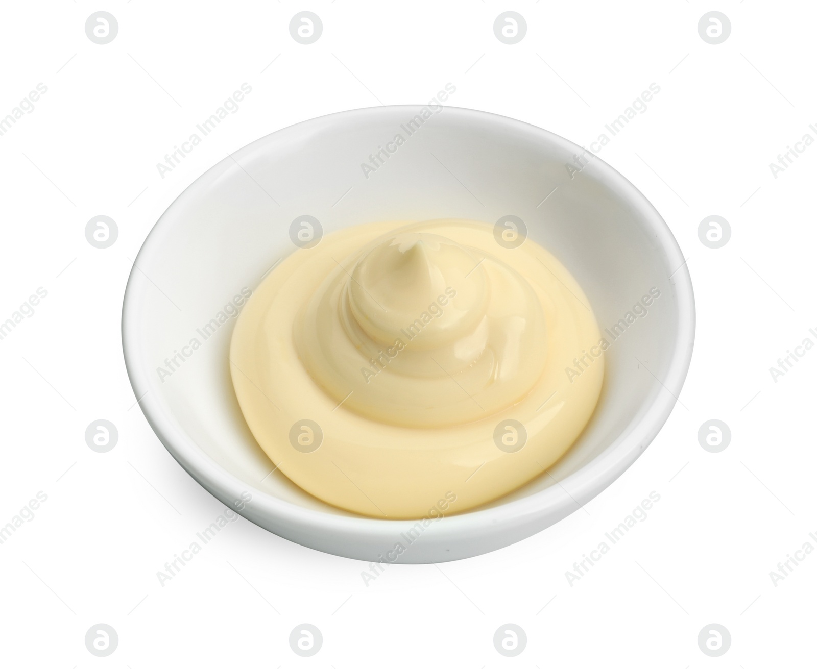 Photo of Fresh mayonnaise sauce in bowl isolated on white