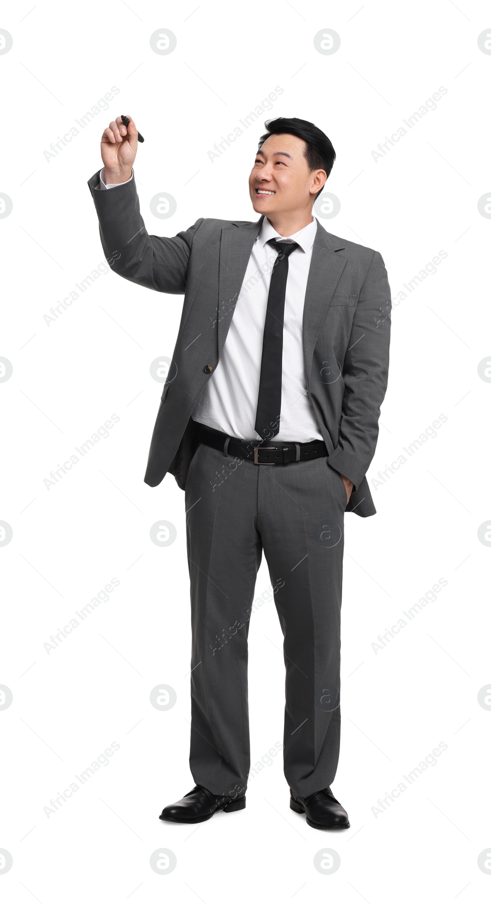 Photo of Businessman with marker writing on white background