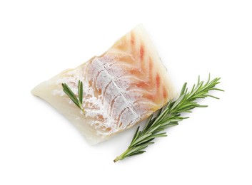 Piece of fresh raw cod with rosemary isolated on white, top view