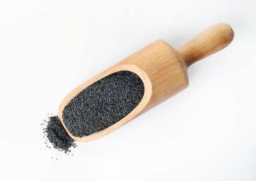 Poppy seeds and wooden scoop on white background, top view