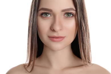 Portrait of young woman with beautiful face on white background