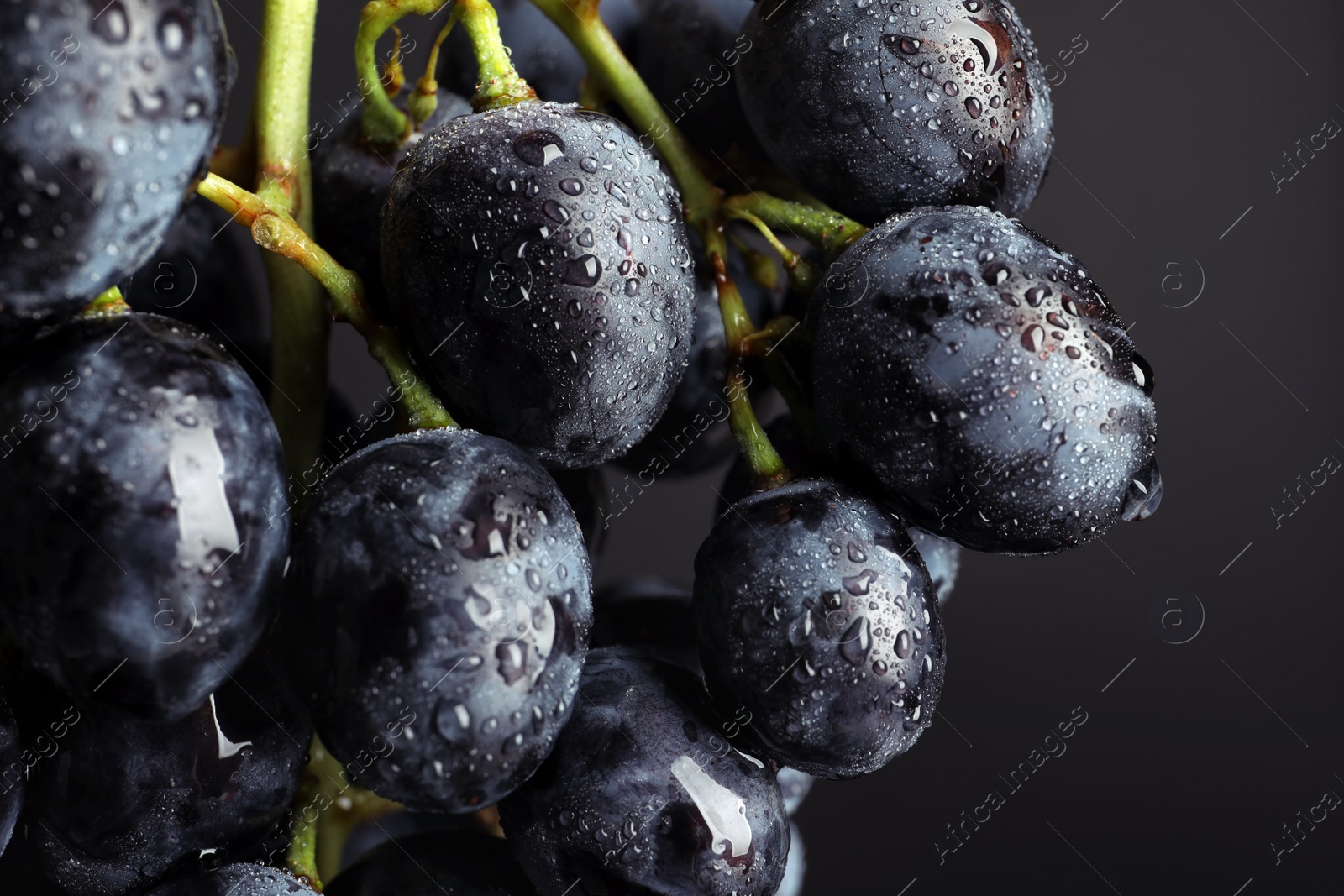 Photo of Bunch of fresh ripe juicy grapes as background. Closeup view