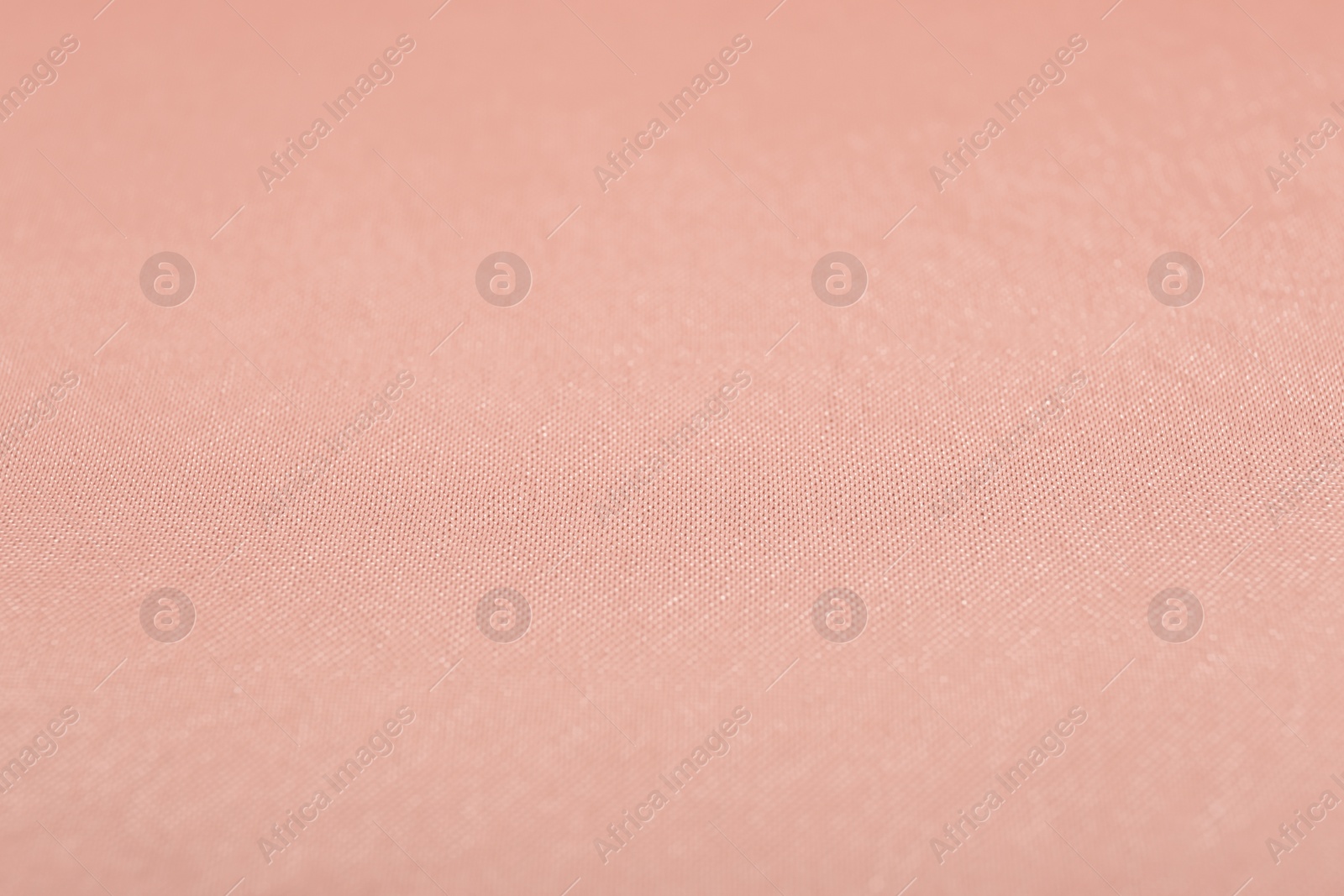 Photo of Texture of rose gold fabric as background