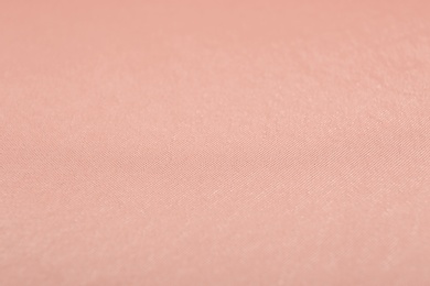 Photo of Texture of rose gold fabric as background