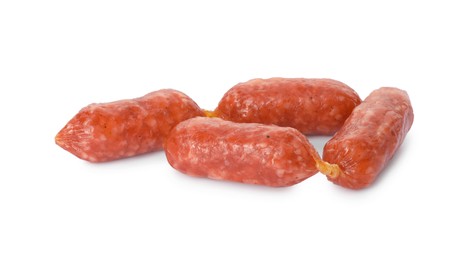 Thin dry smoked sausages isolated on white