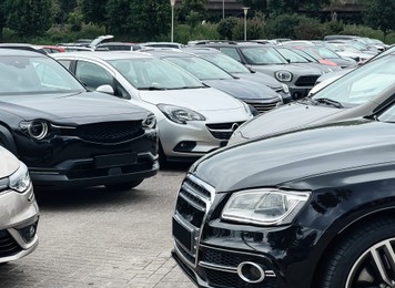 Photo of View of many different cars in parking lot