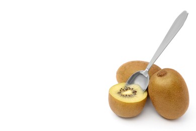 Photo of Fresh ripe yellow kiwis with spoon on white background