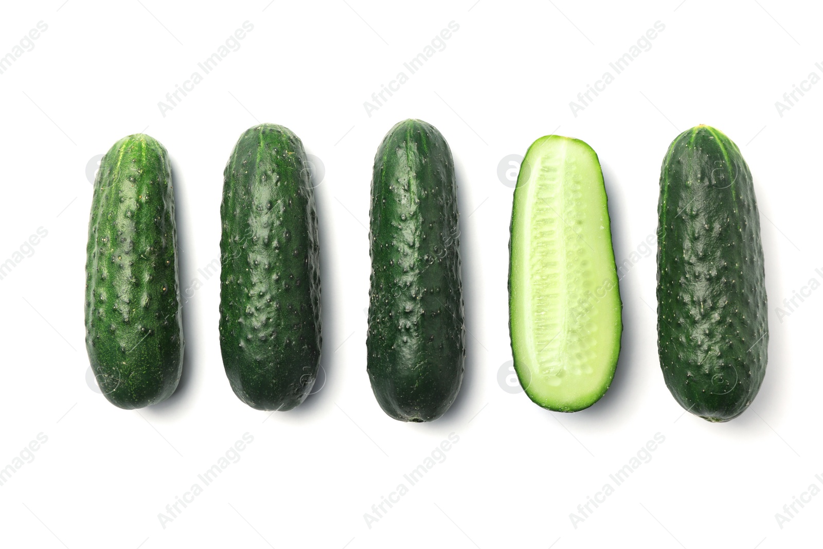 Photo of Flat lay composition with ripe cucumbers on white background