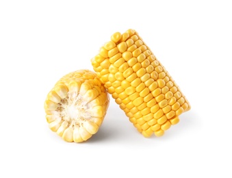 Pieces of ripe raw corn cob on white background