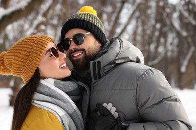 Photo of Beautiful happy couple spending time together on winter day