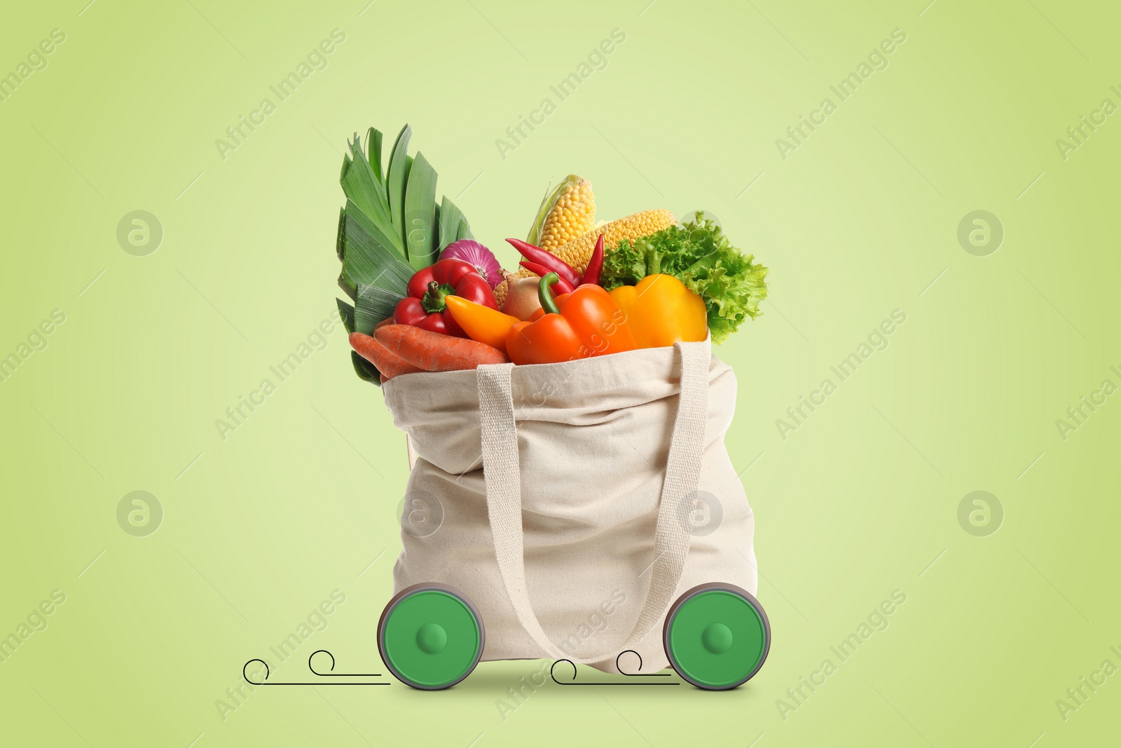 Image of Shopping bag full of products on wheels against light green background. Order hurrying to client. Food delivery service