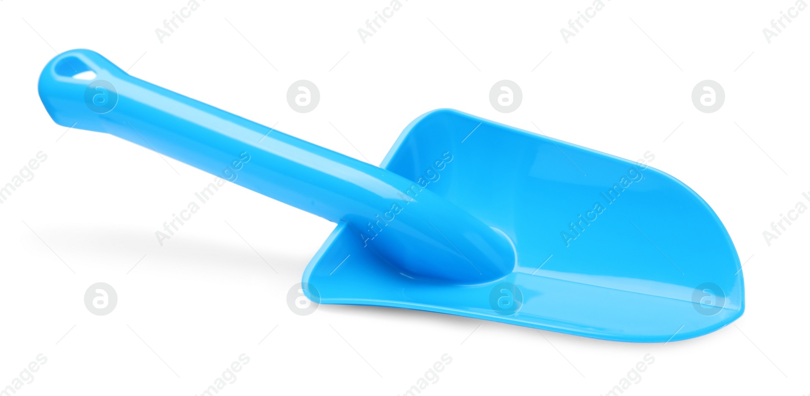 Photo of Light blue plastic toy shovel isolated on white