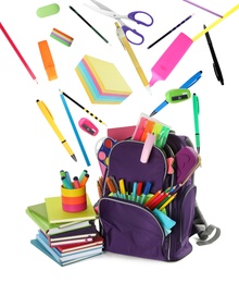 School stationery flying over backpack on white background