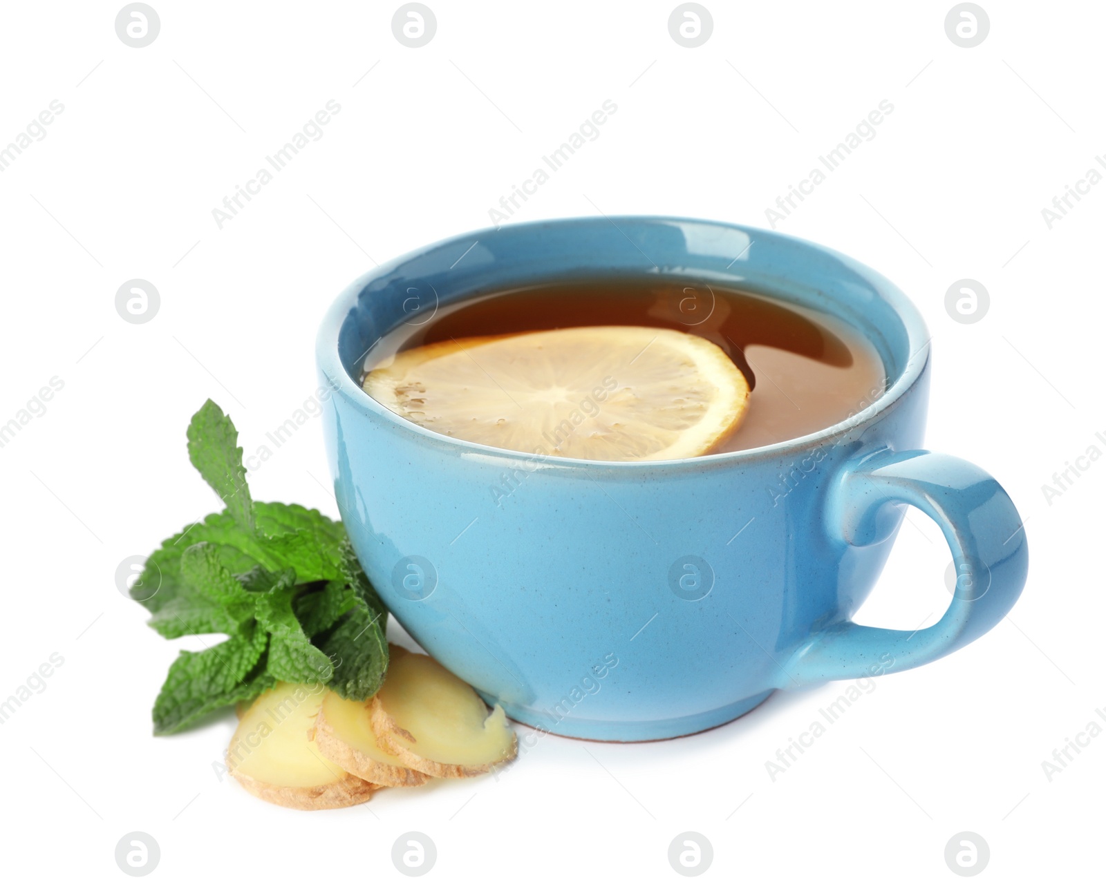Photo of Cup of tea with lemon, mint and ginger on white background. Cough remedies