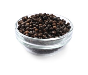 Aromatic spice. Many black peppercorns in bowl isolated on white