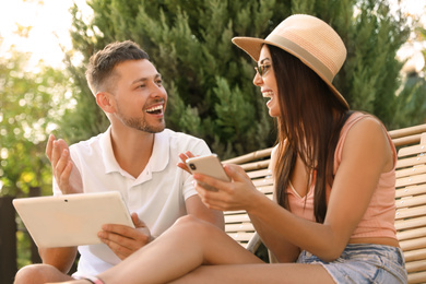 Image of Happy couple spending time together outdoors. Summer vacation