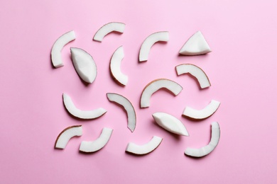 Photo of Coconut pieces on color background