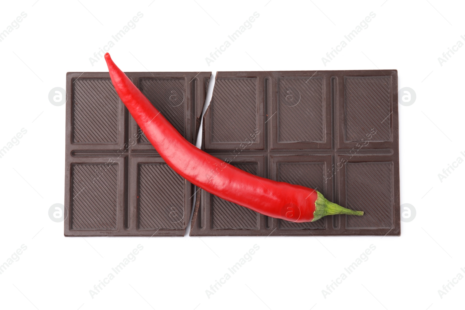 Photo of Dark chocolate bar with red hot chili pepper isolated on white, top view