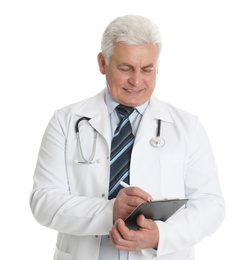 Photo of Senior doctor with clipboard on white background