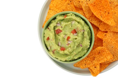Photo of Bowl of delicious guacamole and nachos chips isolated on white, top view