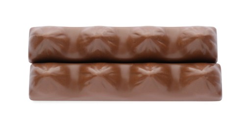 Sweet tasty chocolate bars on white background, top view